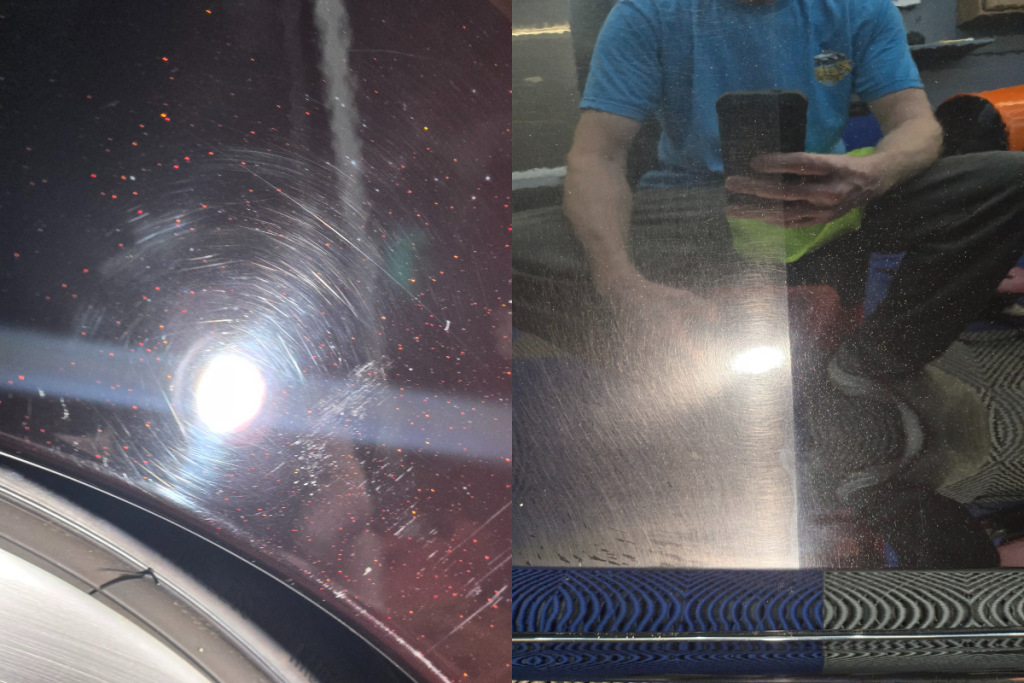 Close-up of light scratches and swirl marks on a black car panel under shop lighting
